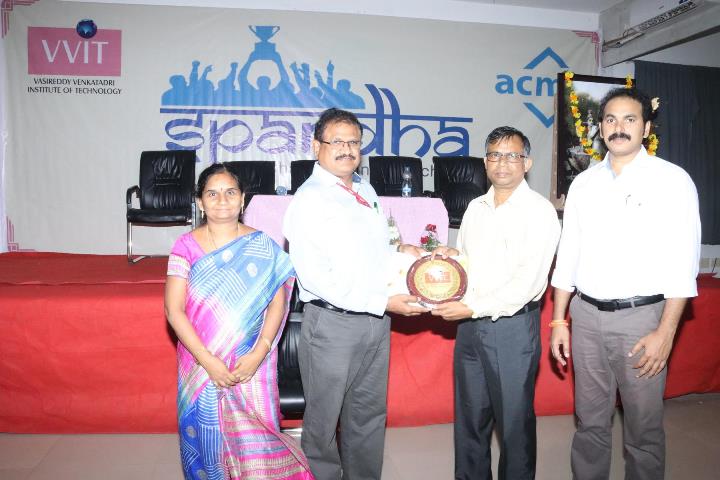 Principal felicitating Prof. Debnath Bhattacharyya